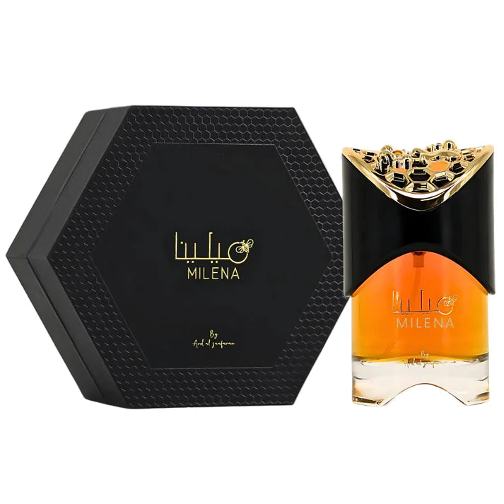 Ard Al Zaafaran Milena Eau de Parfum 100 ml mit schwarzer, hexagonaler Geschenkbox und elegantem schwarz-goldenem Flakon mit bernsteinfarbener Duftflüssigkeit.