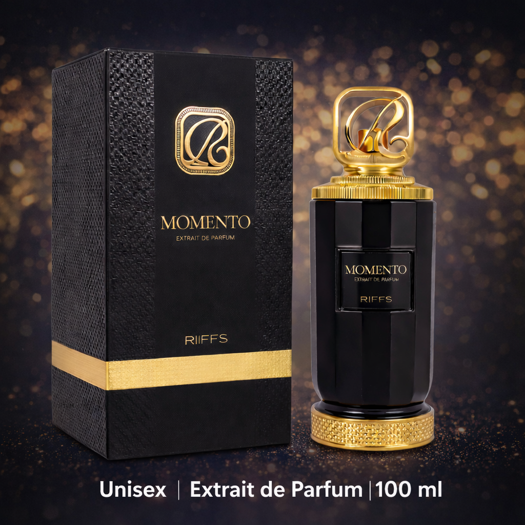 RiiFFS Momento Extrait de Parfum 100 ml Unisex-Duft im schwarzen Flakon mit goldener Kappe neben passender schwarzer Verpackung vor dunklem Hintergrund mit goldenen Lichteffekten.