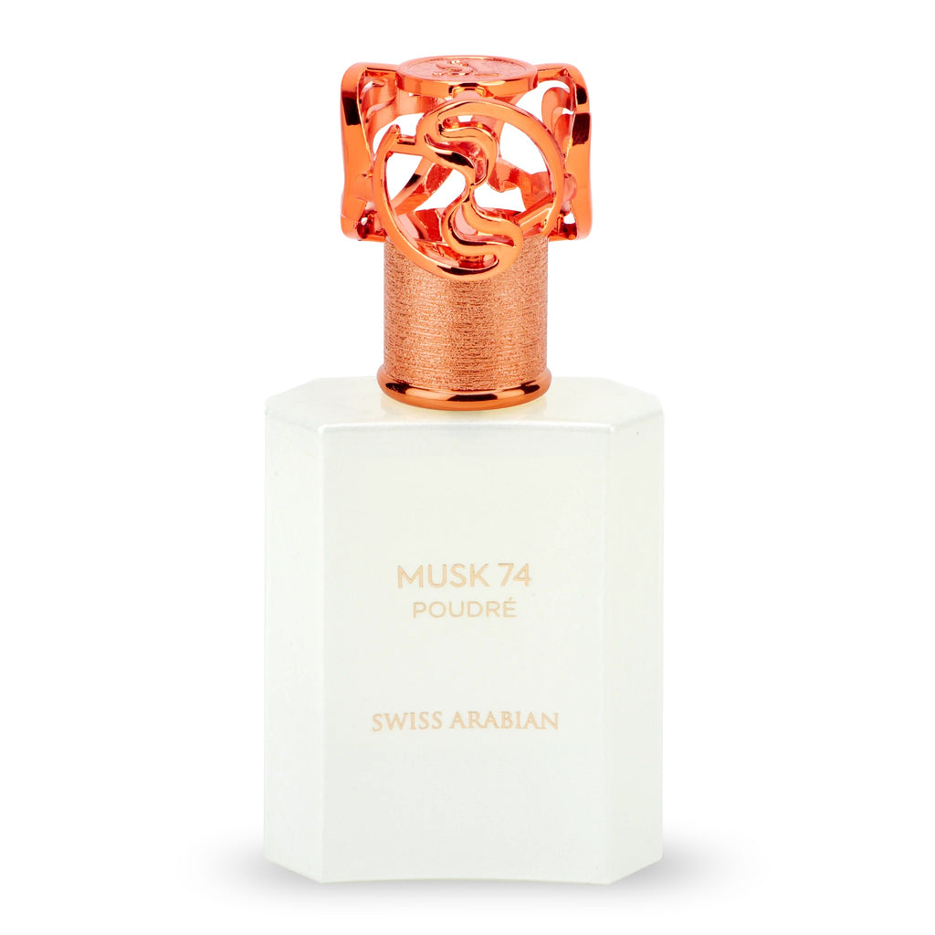 Swiss Arabian Musk 74 Poudré – eleganter, milchig-weißer Glasflakon mit goldener Beschriftung und kunstvoll verziertem, roségoldfarbenem Verschluss; minimalistisches Design mit luxuriöser Ausstrahlung.