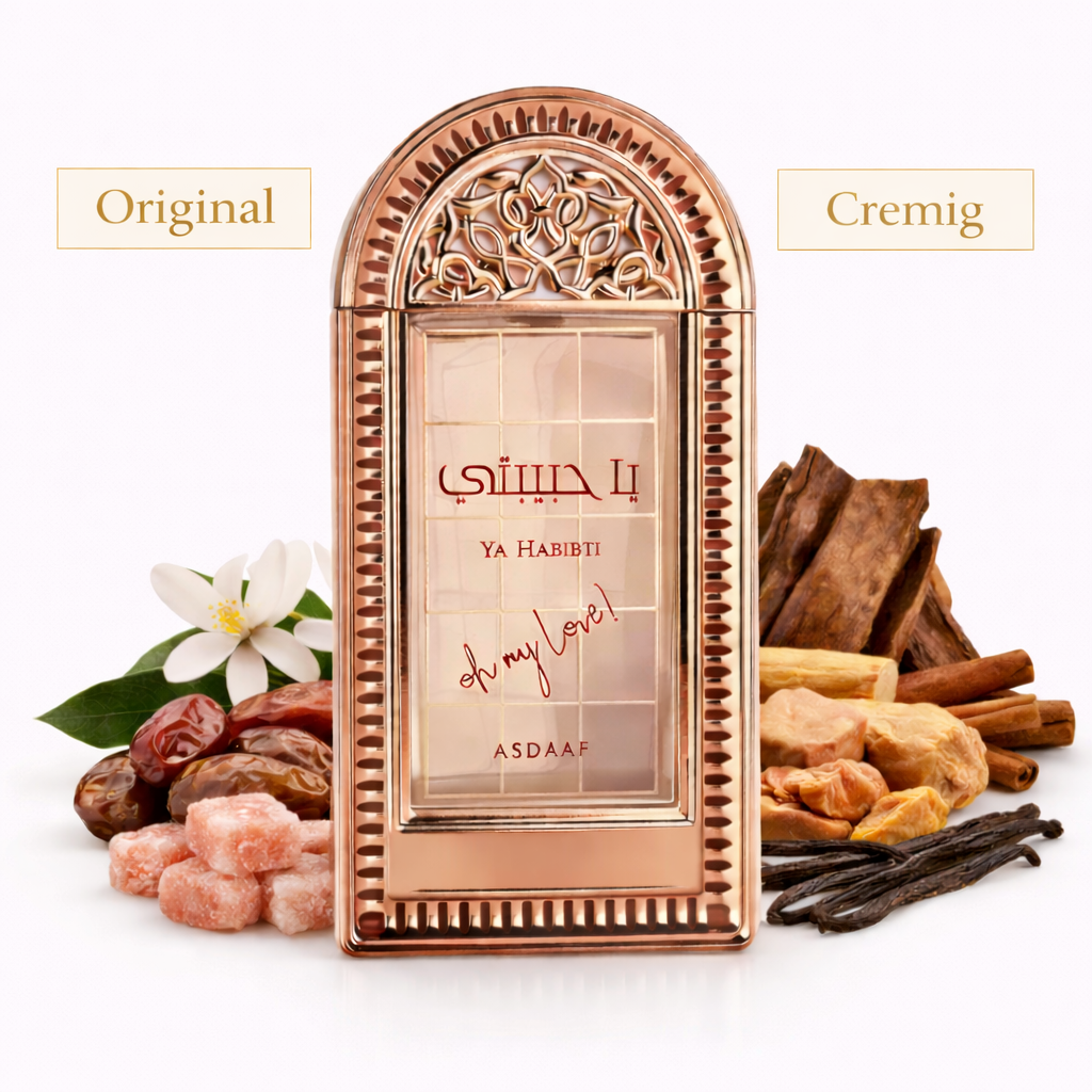 Un'elegante boccetta di profumo con cornice in oro rosa in stile orientale, recante la scritta "Ya Habibi – Asdaaf". Il prodotto è posizionato centralmente su uno sfondo bianco, con ai lati datteri, cristalli di zucchero rosa, fiori bianchi, baccelli di vaniglia, bastoncini di cannella e pezzi di legno, che simboleggiano la fragranza cremosa e dolce.
